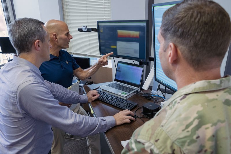 Government - person working at computer with data security interface