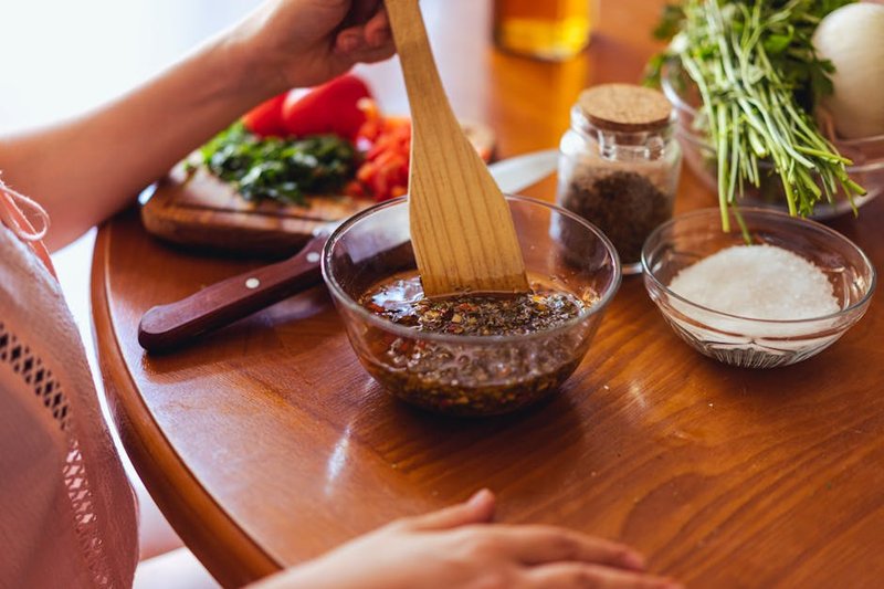 Ones - homemade chimichurri sauce in rustic kitchen setting