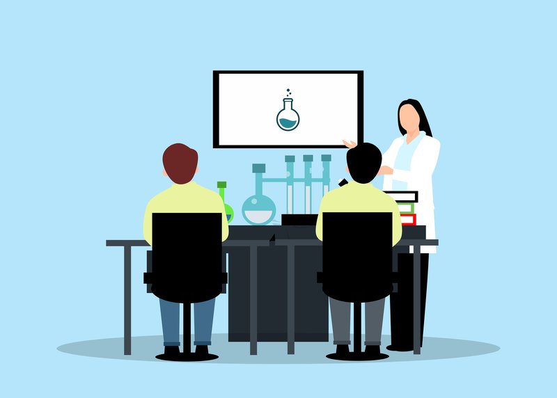 Teachers - teacher interacting with student in classroom setting