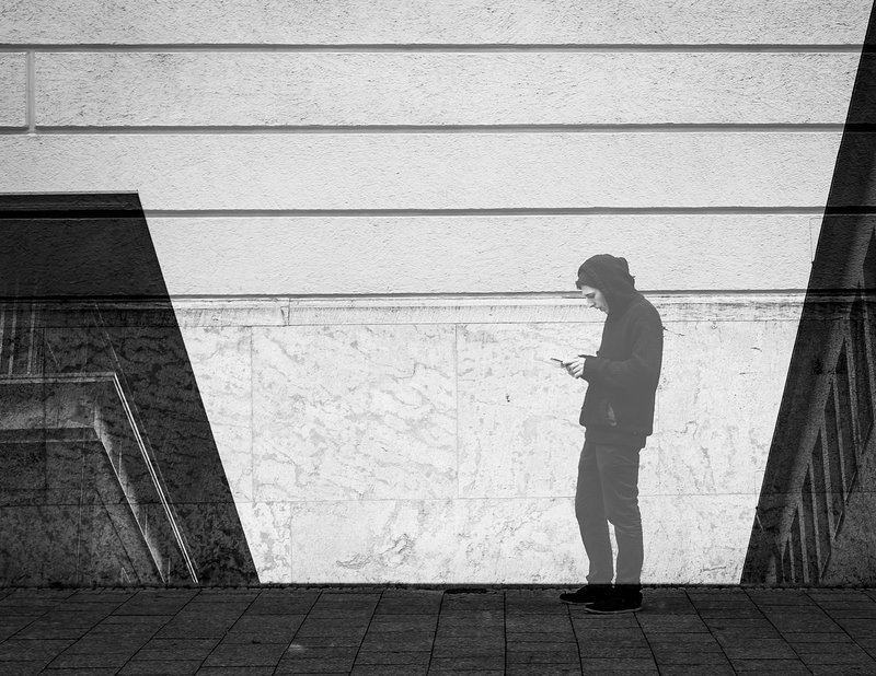 Teachers - teenage boys viewing content on smartphones
